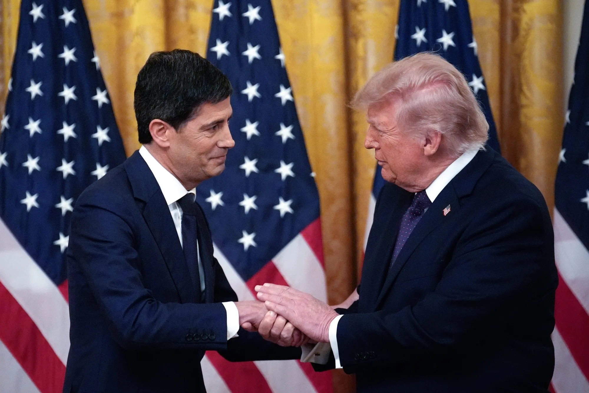 Kevin Warsh y Donald Trump